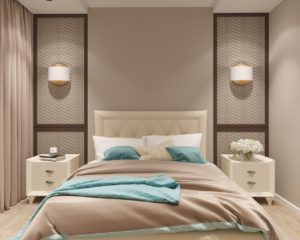 Jasna sypialnia w stylu nowojorskim z dużym łóżkiem tapicerowanym. 